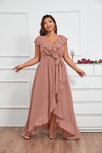 Detail of elegant dusty rose chiffon dress featuring ruffled V-neck and high-low hemline