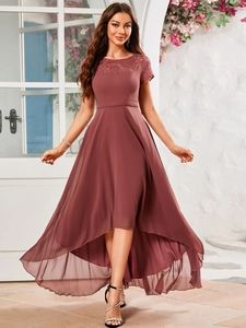 Detail of high-low chiffon evening dress with elegant lace neck and dusty pink hemline