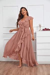 Detail of dusty rose chiffon wrap dress featuring ruffle neckline and high-low hem design