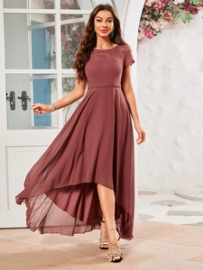 Detail of elegant high-low chiffon hem and floral lace bodice on an evening dress
