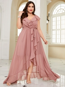 Detail of V-neck ruffled pink chiffon gown with waist tie and asymmetric hemline