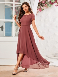Detail of elegant high-low chiffon evening dress with lace neckline and tiered skirt