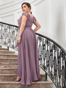 Detailed back view of V-neck chiffon evening gown with ruffle sleeves and open back