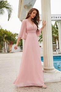 Detail of elegant V-neck pink chiffon evening gown with pleated sleeves and empire waist
