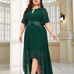 Detail of sequin flower embroidery and teardrop neckline on dark green chiffon dress