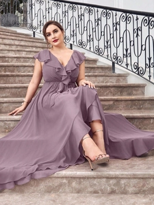 Detail of mauve chiffon maxi dress showing ruffle V-neckline and flowy silhouette