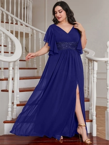 Detail of royal blue V-neck dress featuring sequined waist belt and ruffled short sleeves