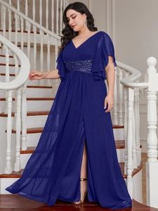 Detail of elegant V-neck blue evening gown with sequin waist and chiffon ruffles