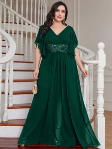 Detail of elegant V-neck plus size gown with flutter sleeves and sequin waist belt