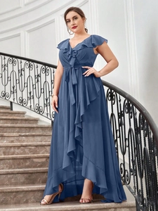 Close-up detail of V-neckline and tiered ruffle layers on this blue chiffon evening dress