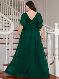 Detail of V-back and ruffled sleeves on dark green chiffon plus size evening gown