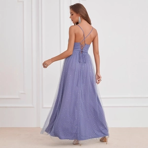 Elegant lavender evening gown with polka dot mesh overlay and cross back straps