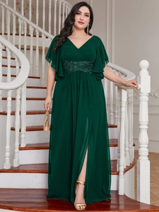 Detail of V-neck dark green maxi dress with sequin waist and elegant flutter sleeves