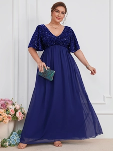 Close-up of elegant V-neck bodice with shimmering navy blue sequins and flared sleeves