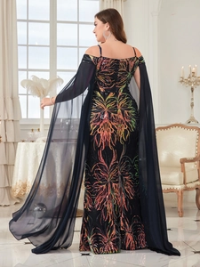 Elegant black off-shoulder sequin gown with gradient patterns and long chiffon cape