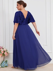 Detail of elegant navy sequined v-neck backless evening gown with chiffon flutter sleeves