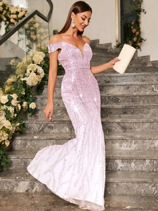Detail of elegant off-shoulder sequin evening gown with sheer deep V-neck and mermaid cut