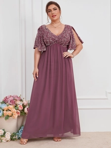 Detail of the elegant V-neckline with shimmering sequins on this grape purple maxi dress