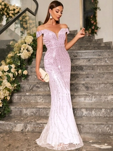 Detail of the pink sequined evening gown featuring off-the-shoulder neckline and fish-tail cut