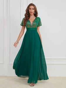 Elegant emerald green V-neck evening gown with gold sequined bodice and chiffon skirt
