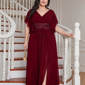 Detail of wine red V-neck evening gown with sequined waist and high slit design