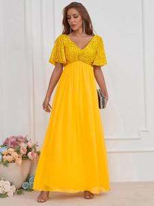 Robe de soirée jaune élégante avec col en V, sequins et jupe en mousseline fluide