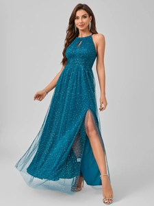 Detail of teal mesh halter evening dress with high slit and shimmering sequin accents