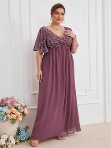 Detail of elegant V-neck sequined bodice and flowing chiffon maxi dress in deep mauve