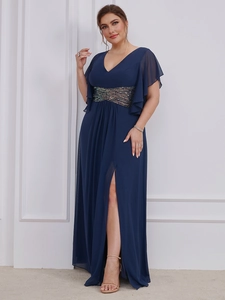 Close-up of the elegant sequined waistband on this navy blue V-neck evening gown