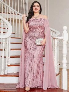Detail of sequins and chiffon cape sleeves on a dusty pink off-shoulder evening gown