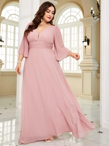 Detailed view of pink deep V-neck maxi dress with pleated flared sleeves and belted waist