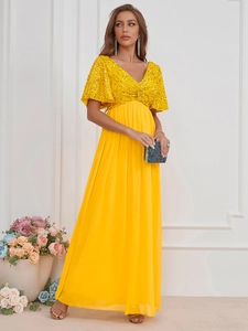 Robe de soirée élégante jaune à col en V avec bustier à paillettes et jupe en mousseline