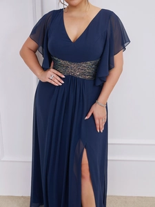 Close-up of navy V-neck dress featuring sequined waist belt and translucent flutter sleeves