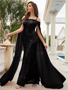 Detail of elegant black sequin evening gown with flowing chiffon cape sleeves and mermaid cut