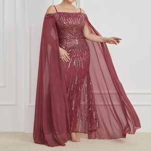 Detail of burgundy sequin evening gown with shimmering silver embroidery and mesh shawl