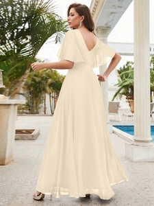 Elegant champagne chiffon dress with deep V-neck and ruffled sleeves backless detail