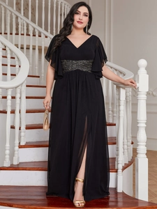 Close-up of elegant V-neck gown featuring sequined waist detail and high side slit