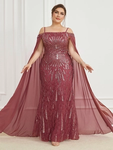 Detail of burgundy sequin evening gown with cape sleeves and sparkling geometric patterns