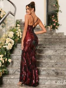 Detailed view of crisscross open back straps and sequins on the gradient evening dress