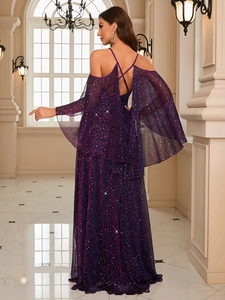 Detail of cross back straps on purple sequin evening dress with sparkling fabric