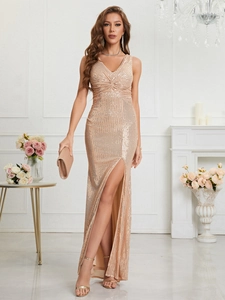 Detail of elegant V-neck sequined dress featuring a high slit and champagne sparkle finish