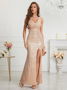 Detail of champagne gold sequined evening gown featuring V-neck and high leg slit