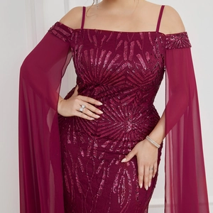 Detail of burgundy sequin maxi dress featuring off-shoulder straps and chiffon cape sleeves