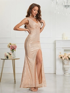 Close-up of rose gold sequin V-neck evening gown with twist detail and high slit