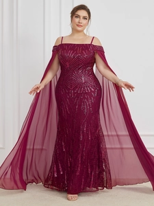 Detail of burgundy plus size sequin gown with geometric patterns and sheer cape