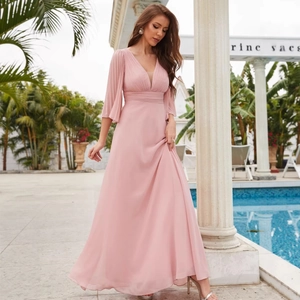 Elegant pink chiffon evening gown with deep V-neck and pleated long sleeves for formal events