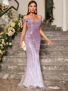 Detail of lavender sequin evening gown showing off-shoulder neckline and fishtail hem