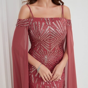 Detail of sequined embroidery and cape sleeves on this rose pink evening dress