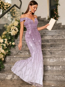 Detailed view of shimmering sequins and slim mermaid cut on light purple evening dress