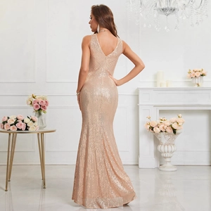 Elegant rose gold sequin evening gown with a deep V-back and fishtail silhouette